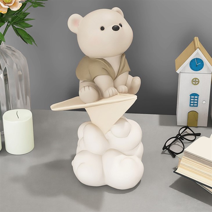 Paper Plane And Bear Statue
